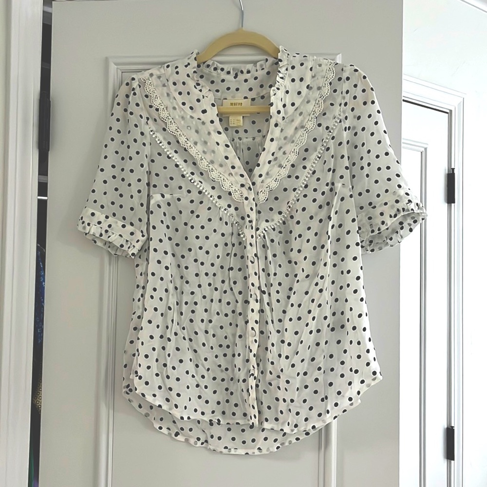Anthropology women’s top. Never worn. Size 4